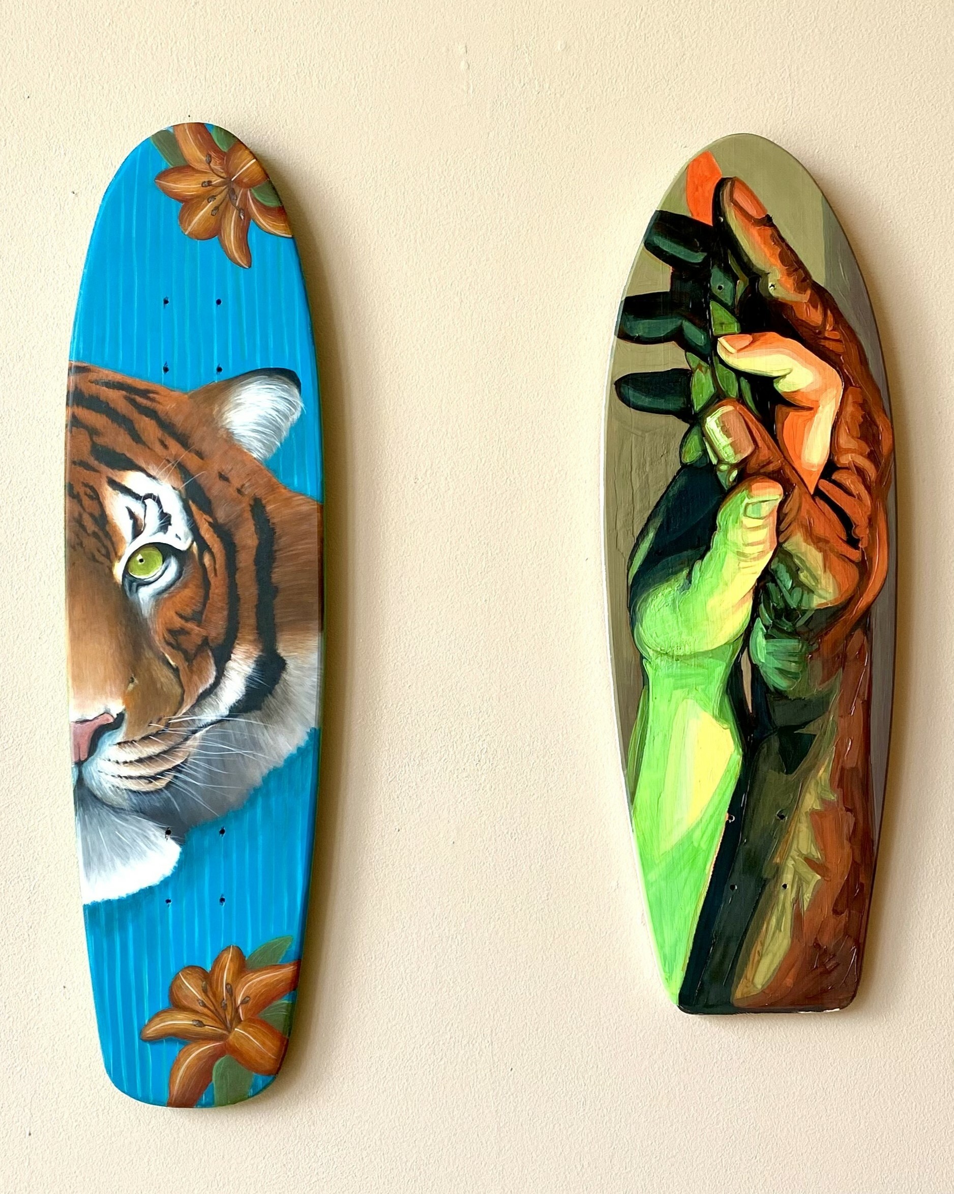 (Left) Molly-Anne Alape, "Tiger," 2023, Acrylic paint on wood; (Right) Angela Godoy, "Hands," 2023, Oil paint on wood